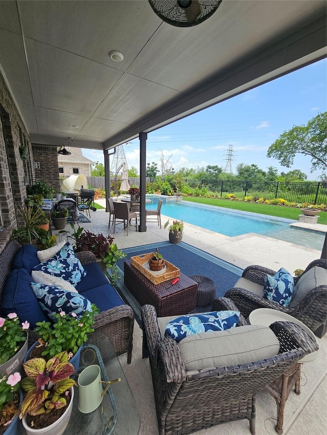 1013 Goose Creek St, Webster, TX 77598 - fenced backyard with outdoor lounge area, a patio, and outdoor dining area