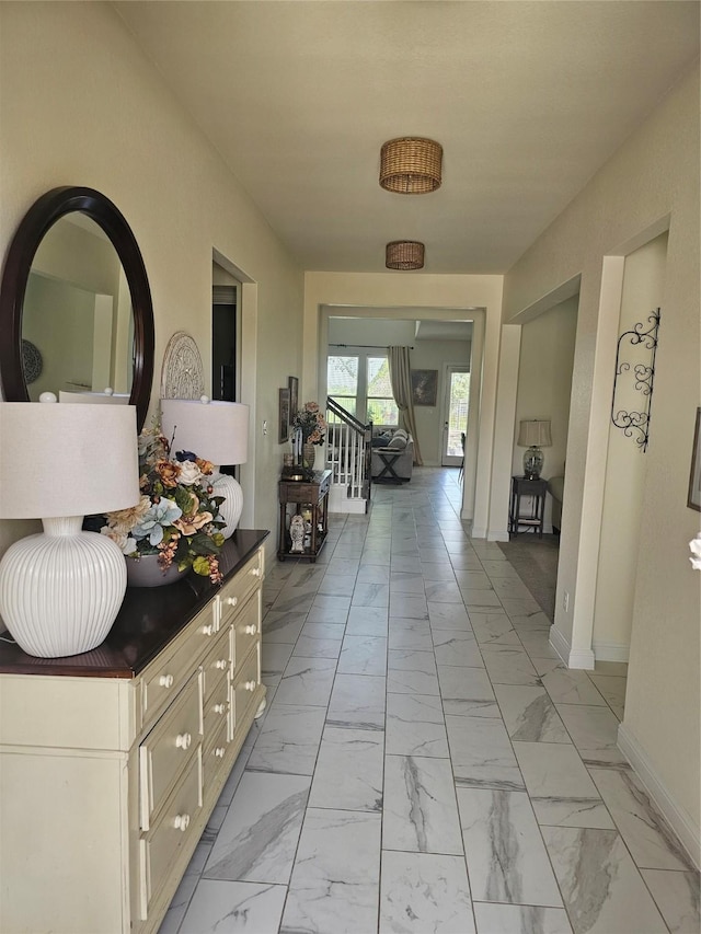1013 Goose Creek St, Webster, TX 77598 - hall featuring light marble finish floors