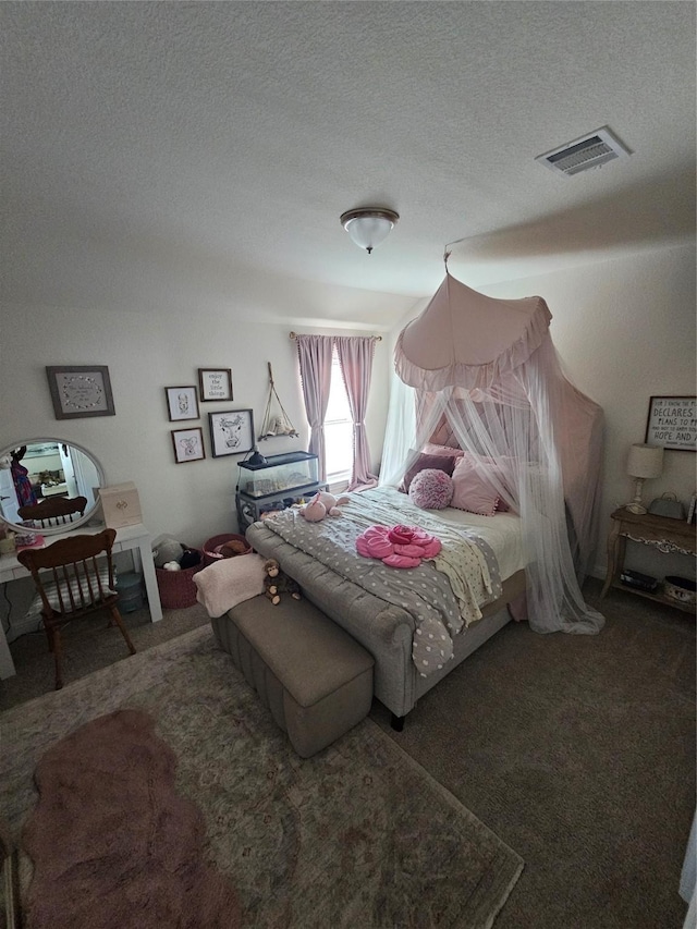 1013 Goose Creek St, Webster, TX 77598 - carpeted bedroom with a textured ceiling