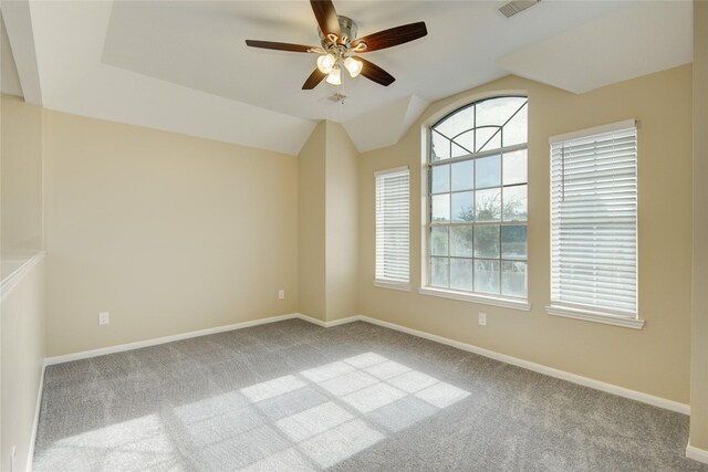 10900 Spruce Dr N, La Porte, TX 77571 - unfurnished room with a ceiling fan, carpet flooring, plenty of natural light, and vaulted ceiling