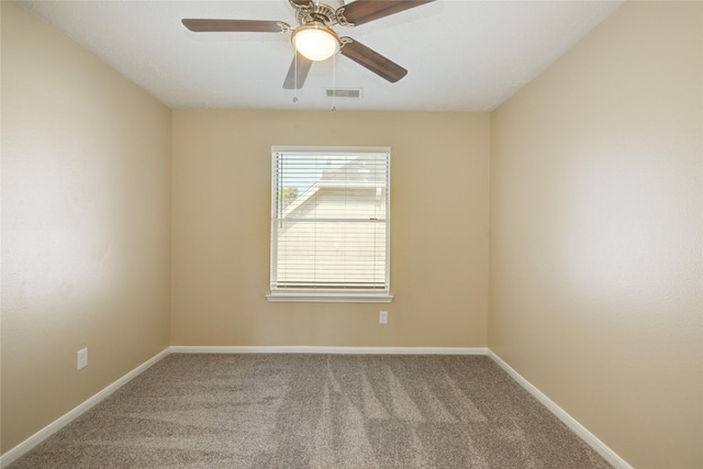 10900 Spruce Dr N, La Porte, TX 77571 - carpeted spare room featuring baseboards and ceiling fan
