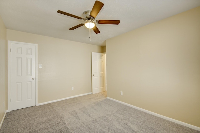 10900 Spruce Dr N, La Porte, TX 77571 - carpeted empty room with ceiling fan and baseboards