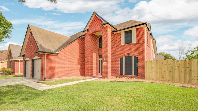 10900 Spruce Dr N, La Porte, TX 77571 - traditional-style home featuring brick siding, roof with shingles, and driveway