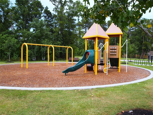21336 Kings Guild Ln, Kingwood, TX 77339 - community playground featuring a yard