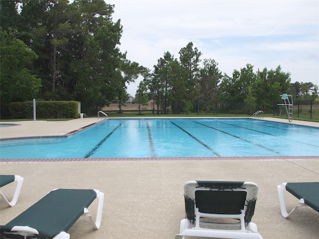 community pool with fence