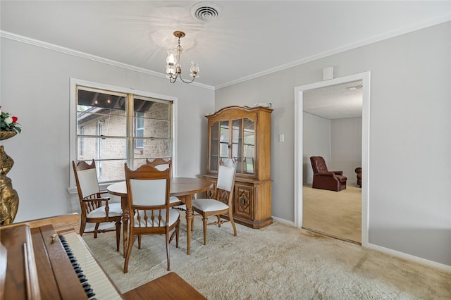 5402 Tallow Ln, Houston, TX 77021 - carpeted dining area with crown molding, a chandelier, and baseboards