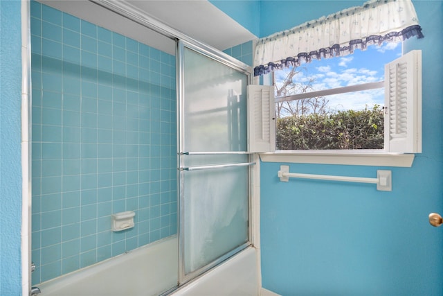 5402 Tallow Ln, Houston, TX 77021 - bathroom featuring shower / bath combination with glass door