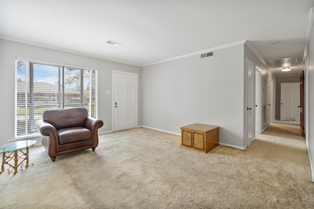 5402 Tallow Ln, Houston, TX 77021 - sitting room featuring crown molding, carpet floors, baseboards, and attic access