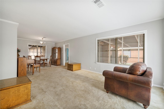 5402 Tallow Ln, Houston, TX 77021 - living room featuring ornamental molding, baseboards, carpet, and a chandelier