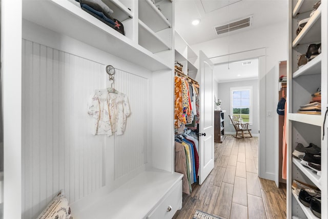 3785 County Road 405, Anderson, TX 77830 - mudroom featuring attic access and dark wood finished floors