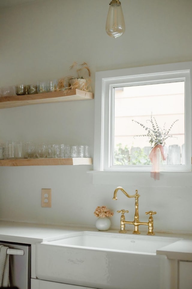 713 Usener St, Houston, TX 77009 - detailed view of a sink and dishwasher