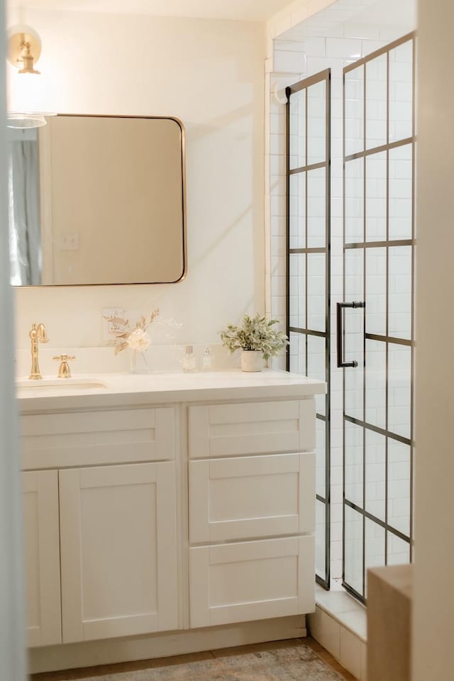 713 Usener St, Houston, TX 77009 - bathroom featuring a stall shower and vanity