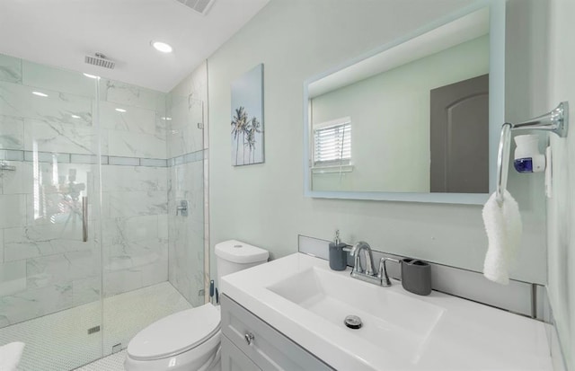 1019 Treaty Dr, Surfside Beach, TX 77541 - full bath featuring toilet, a marble finish shower, vanity, and recessed lighting