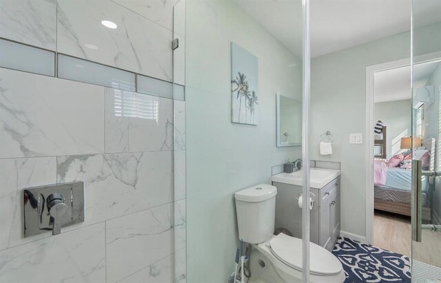 1019 Treaty Dr, Surfside Beach, TX 77541 - full bath with connected bathroom, toilet, plenty of natural light, and vanity