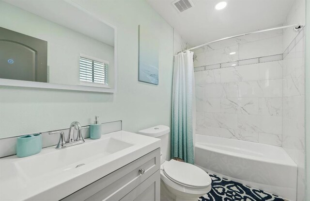 1019 Treaty Dr, Surfside Beach, TX 77541 - full bath with toilet, shower / tub combo, and vanity