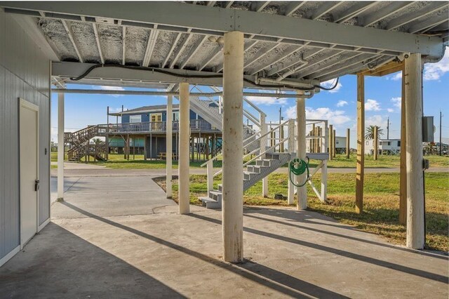 1019 Treaty Dr, Surfside Beach, TX 77541 - view of patio with stairway