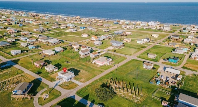 1019 Treaty Dr, Surfside Beach, TX 77541 - aerial view of property and surrounding area with a large body of water