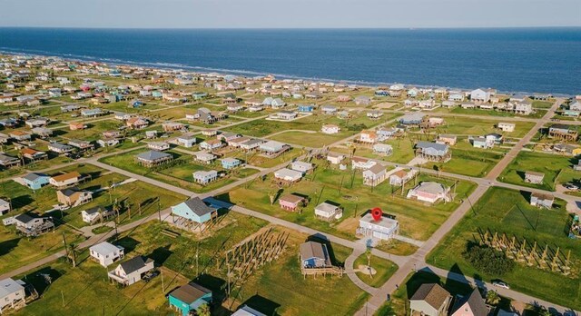 1019 Treaty Dr, Surfside Beach, TX 77541 - aerial overview of property's location featuring a nearby body of water and nearby suburban area