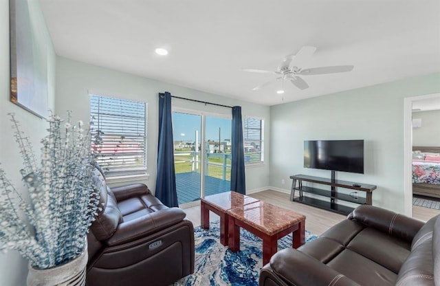 1019 Treaty Dr, Surfside Beach, TX 77541 - living area featuring wood finished floors, ceiling fan, baseboards, and recessed lighting