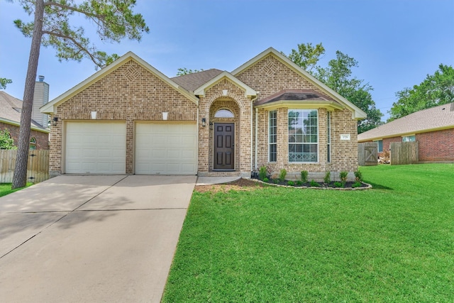 3729 Breckenridge Dr, Montgomery, TX 77356 - traditional-style house with brick siding, driveway, and an attached garage