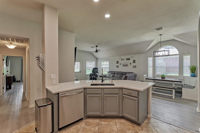3729 Breckenridge Dr, Montgomery, TX 77356 - kitchen featuring dishwasher, gray cabinetry, a sink, vaulted ceiling, and a ceiling fan