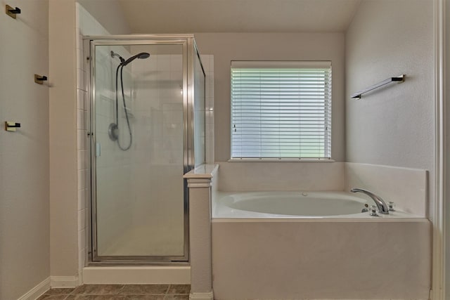 3729 Breckenridge Dr, Montgomery, TX 77356 - bathroom with a stall shower, a bath, and tile patterned flooring