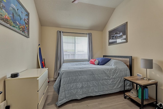 3729 Breckenridge Dr, Montgomery, TX 77356 - bedroom featuring vaulted ceiling and light wood-style flooring