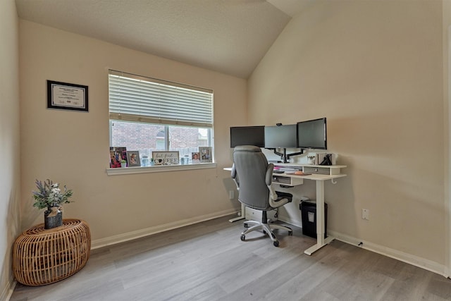 3729 Breckenridge Dr, Montgomery, TX 77356 - office featuring vaulted ceiling, wood finished floors, and baseboards