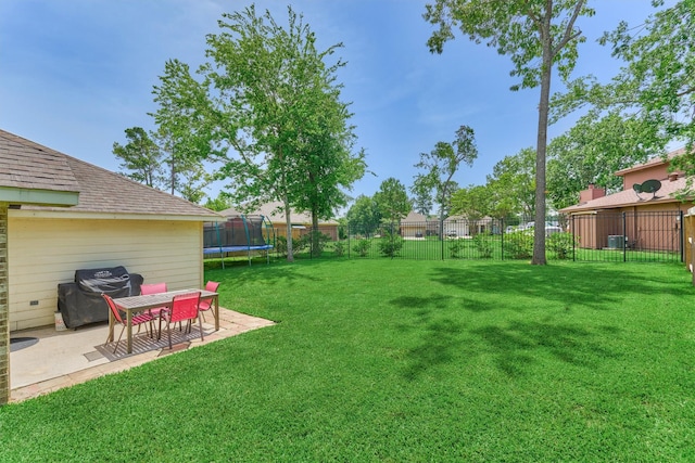 3729 Breckenridge Dr, Montgomery, TX 77356 - view of yard with a trampoline and a patio area