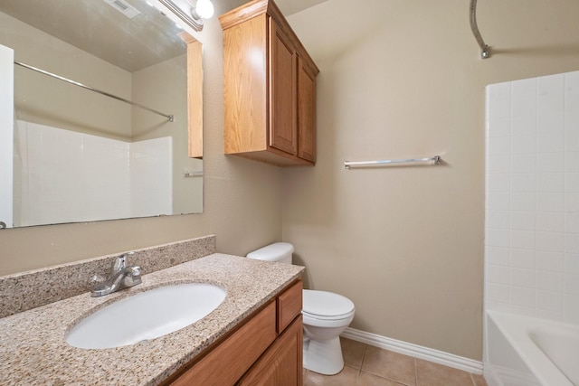1001 Krenek Tap Rd Unit 1501, College Station, TX 77840 - bathroom featuring toilet, tile patterned floors, vanity, bathtub / shower combination, and baseboards