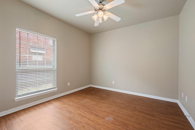 1001 Krenek Tap Rd Unit 1501, College Station, TX 77840 - unfurnished room featuring wood finished floors, plenty of natural light, baseboards, and ceiling fan