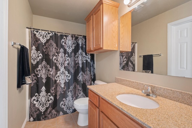 1001 Krenek Tap Rd Unit 1501, College Station, TX 77840 - full bathroom featuring toilet, tile patterned flooring, vanity, and a shower with curtain
