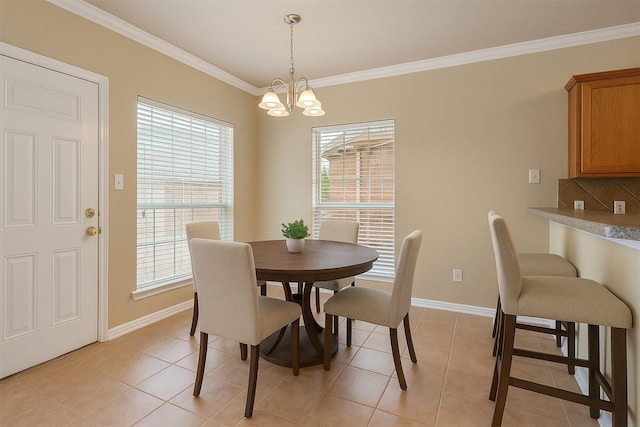 1001 Krenek Tap Rd Unit 1501, College Station, TX 77840 - dining area with ornamental molding, a chandelier, plenty of natural light, baseboards, and light tile patterned flooring