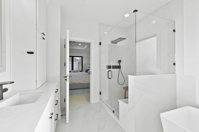 5115 Maple St, Houston, TX 77401 - bathroom featuring a marble finish shower, ensuite bathroom, marble finish floors, a freestanding tub, and recessed lighting