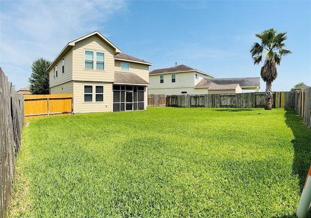 13938 Kenswick Key Ln, Houston, TX 77047 - back of house featuring a sunroom