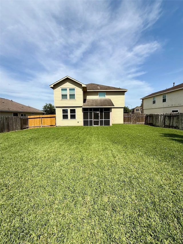 13938 Kenswick Key Ln, Houston, TX 77047 - rear view of property with a sunroom