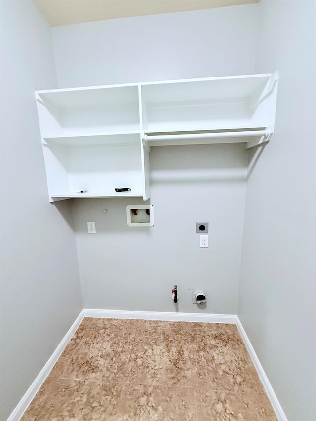 13938 Kenswick Key Ln, Houston, TX 77047 - laundry room featuring hookup for a gas dryer, electric dryer hookup, hookup for a washing machine, and baseboards