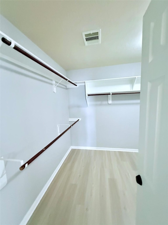 13938 Kenswick Key Ln, Houston, TX 77047 - spacious closet featuring light wood-style flooring