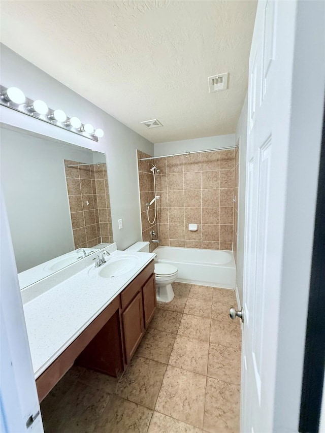 13938 Kenswick Key Ln, Houston, TX 77047 - full bathroom featuring vanity, tub / shower combination, toilet, and a textured ceiling