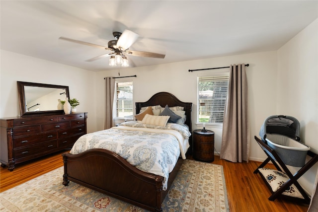 8914 Railton St, Houston, TX 77080 - bedroom with wood finished floors and a ceiling fan