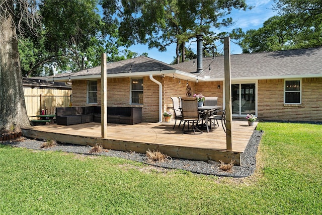 8914 Railton St, Houston, TX 77080 - back of property featuring brick siding, outdoor dining area, outdoor lounge area, roof with shingles, and a deck