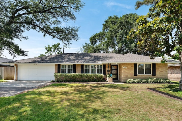8914 Railton St, Houston, TX 77080 - ranch-style home featuring brick siding, an attached garage, driveway, and a front yard