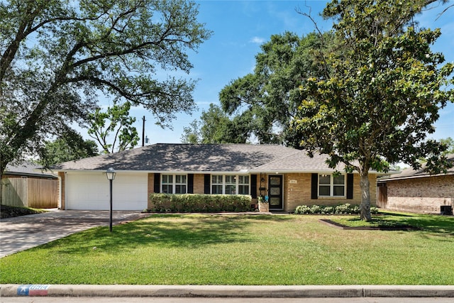8914 Railton St, Houston, TX 77080 - ranch-style house with an attached garage, concrete driveway, and brick siding