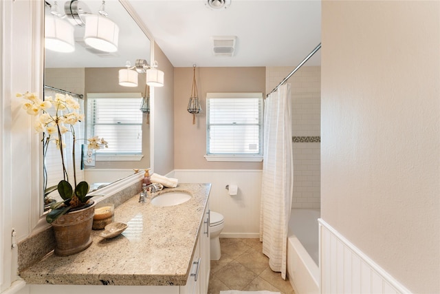 8914 Railton St, Houston, TX 77080 - full bath featuring toilet, vanity, tile patterned floors, and shower / bath combo with shower curtain