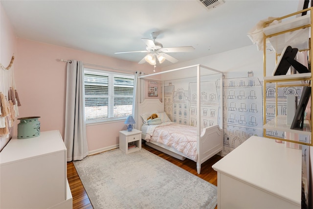 8914 Railton St, Houston, TX 77080 - bedroom featuring dark wood-style flooring, baseboards, and ceiling fan