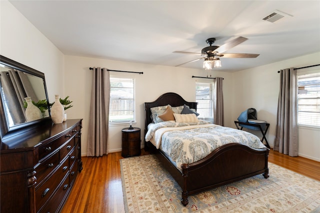 8914 Railton St, Houston, TX 77080 - bedroom with multiple windows and light wood-type flooring