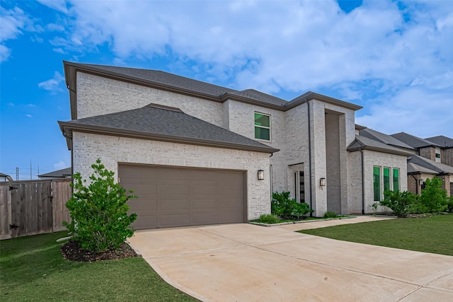 21714 Jenolan Ridge Rd, Cypress, TX 77433 - view of front of house featuring driveway, a garage, brick siding, and a shingled roof