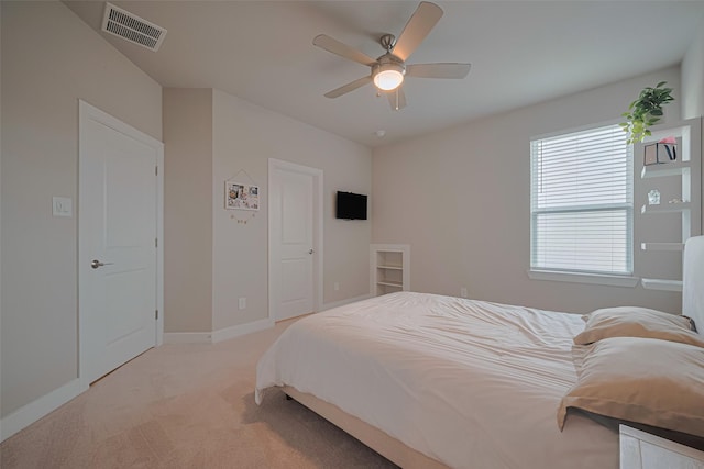 21714 Jenolan Ridge Rd, Cypress, TX 77433 - bedroom featuring light carpet, ceiling fan, and baseboards