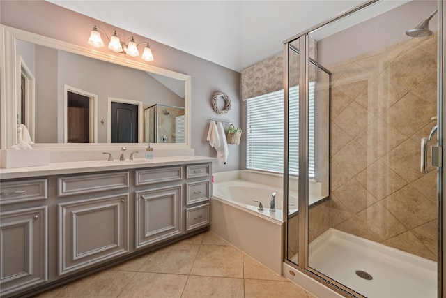27438 Channing Springs Dr, Spring, TX 77386 - bathroom with a garden tub, vanity, a shower stall, tile patterned floors, and vaulted ceiling
