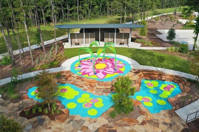 15040 Berry Brook Dr, Conroe, TX 77302 - view of swimming pool with a wooded view and a lawn